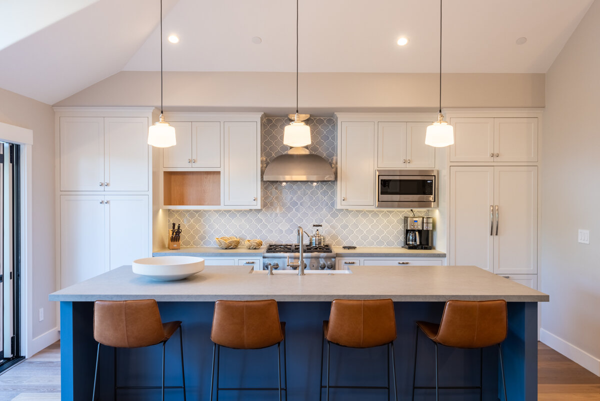 Award-winning Carmel-by-the-Sea cottage remodel by Lewis Builders with open-concept kitchen and expanded deck