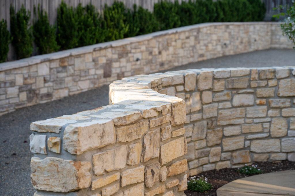 Close-up of dry stack stone retaining wall at a Carmel outdoor living remodel